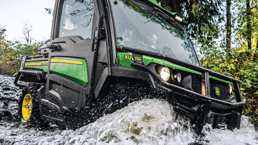 Gator going through water on a trail 