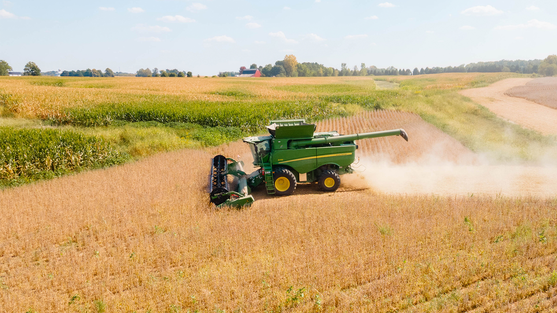 John Deere combine harvesting soybeans in Ohio — Koenig Equipment