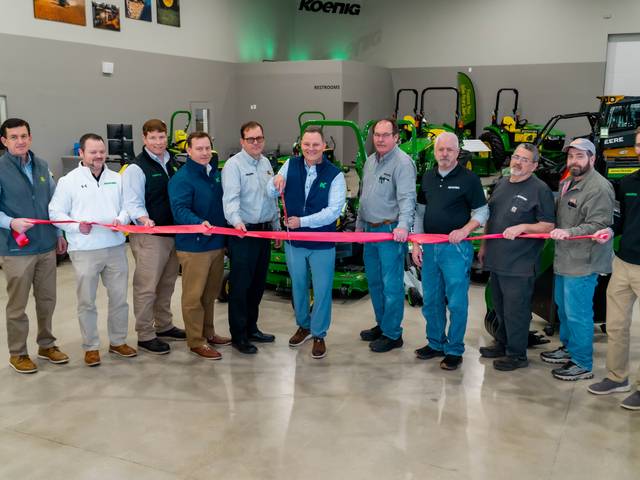 The Koenig Equipment team cutting the ribbon at the Knightstown, Indiana store